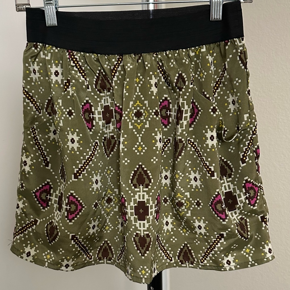 Olive green mini skirt with colorful  patterned